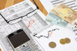 Business - financial graphs and a mobile phone