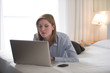 Woman working in hotel room