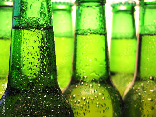 Photo: Row of beer bottles Row of beer bottles