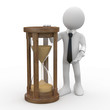 Man with tie and suit, leaning on an hourglass
