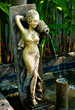 The Sculpture ceramic of women with fountain
