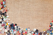 Buttons frame on fabric texture background