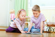 Brother and sister reading