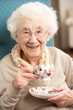 Photo: Senior Woman Enjoying Cup Of Tea At Home Senior Woman Enjoying Cup Of Tea At Home