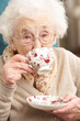 Senior Woman Enjoying Cup Of Tea At Home