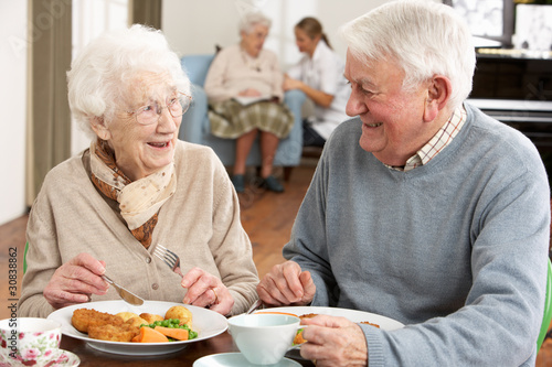 Photo: Senior Couple Enjoying Meal Together Senior Couple Enjoying Meal Together