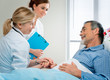 doctor examining a senior patient in hospital doctor examining a senior patient in hospital