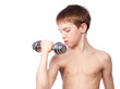 Tennager holds dumbbell Tennager holds dumbbell