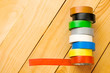 Insulation tape isolated on wooden background