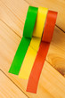 Insulation tape isolated on wooden background
