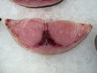 tuna fish slices on ice, at the central market