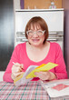 woman with utility bills