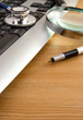 stethoscope and keyboard with pen on wood texture stethoscope and keyboard with pen on wood texture