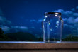 Fireflies in a jar at night