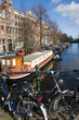 Canal seen from bridge in Amsterdam, Netherlands Canal seen from bridge in Amsterdam, Netherlands