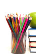 apple, books and colored pencil