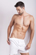 Closeup of a muscular handsome man in underwear