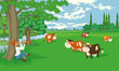 Herd of cows grazing in the meadow