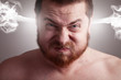 Photo: Stress concept - angry man with exploding head Stress concept - angry man with exploding head