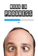 Young man with Work in progress mark over his head