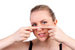 woman squeeze pimple on white background