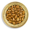 Argan fruits in a golden dish
