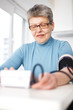 woman measured her blood pressure woman measured her blood pressure