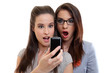 portrait of two surprised women