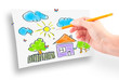 Woman's hand and dream home Woman's hand and dream home