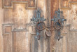Padlock on an old wooden doors