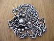 silver chain and medallion