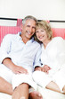 Happy mature couple at home
