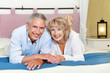 Happy mature couple at home