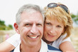 Mature couple smiling and embracing