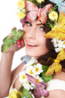 Girl with butterfly and flower on head.