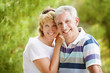 Mature couple smiling and embracing Mature couple smiling and embracing