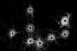 Broken glass - bullet holes isolated on black Broken glass - bullet holes isolated on black