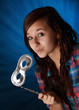 teen holding a silver mask