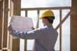 Site manager with building plans