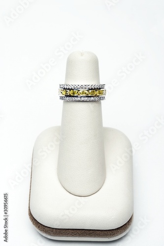 Photo: 3 platinum stackable rings with 2.75 carat yellow oval diamonds and 1.00 carat full cut diamonds 3 platinum stackable rings with 2.75 carat yellow oval diamonds and 1.00 carat full cut diamonds