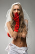 surprised bride covers her breasts