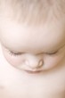 9 month old baby looking down