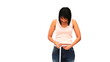 Cute asian woman measuring her belly