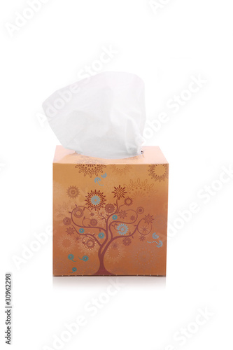 Photo: Tissue box isolated on white Tissue box isolated on white