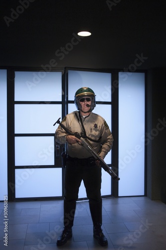 Photo: Nightwatch patrolman with rifle Nightwatch patrolman with rifle