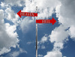 Road sign in the heaven and hell against the sky Road sign in the heaven and hell against the sky