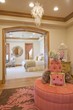 Looking into a bedroom interior from adjoining room