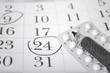 Birth control pills and pen closeup Birth control pills and pen closeup