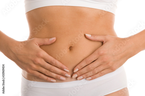 Photo: Woman's hands on stomach Woman's hands on stomach