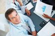 Confident male executive in a financial meeting